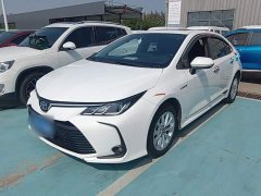 Toyota Corolla 2021 Hybrid 1.8L E-CVT Elite - ფოტო 1