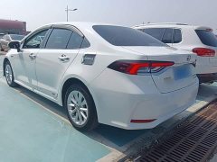 Toyota Corolla 2021 Hybrid 1.8L E-CVT Elite - ფოტო 4