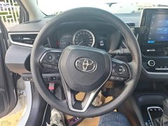 Toyota Corolla Hybrid 1.8L E-CVT Elite - ფოტო 11