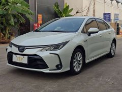Toyota Corolla 2021 Hybrid 1.8L E-CVT Elite - ფოტო 1