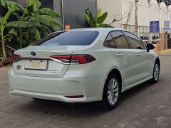 Toyota Corolla 2021 Hybrid 1.8L E-CVT Elite - ფოტო 4