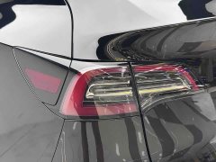 Tesla Model Y Standard Range RWD - ფოტო 11