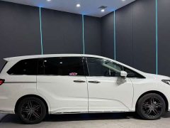Honda Odyssey 2.0L e:HEV Sharp Prestige Edition - ფოტო 4