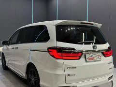 Honda Odyssey 2.0L e:HEV Sharp Prestige Edition - ფოტო 8