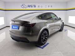 Tesla Model Y Standard Range RWD - ფოტო 3
