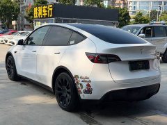 Tesla Model Y Standard Range RWD - ფოტო 4