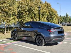Tesla Model Y Rear-Wheel Drive - ფოტო 4