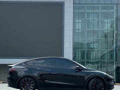 Tesla Model Y Performance All-Wheel Drive - ფოტო 5