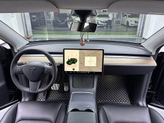 Tesla Model Y Rear-Wheel Drive - ფოტო 4