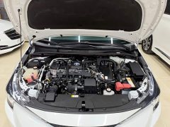Toyota Corolla Hybrid 1.8H E-CVT Luxury - ფოტო 19
