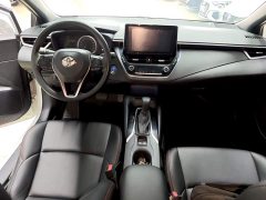 Toyota Corolla Hybrid 1.8H E-CVT Luxury - ფოტო 9