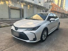 Toyota Corolla 2021 Hybrid 1.8L E-CVT Elite - ფოტო 1