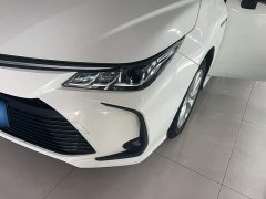 Toyota Corolla 2021 Hybrid 1.8L E-CVT Elite - ფოტო 2