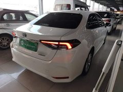 Toyota Corolla 2021 Hybrid 1.8L E-CVT Elite - ფოტო 6