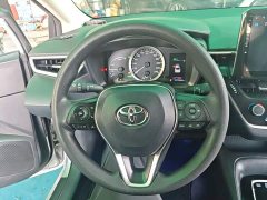 Toyota Corolla 2021 Hybrid 1.8L E-CVT Elite - ფოტო 10