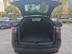 Tesla Model Y Rear-Wheel Drive - ფოტო 18