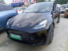 Tesla Model Y Rear-Wheel Drive - ფოტო 1