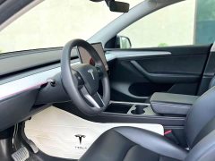 Tesla Model Y Rear-Wheel Drive - ფოტო 4