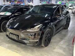 Tesla Model Y Rear-Wheel Drive - ფოტო 1