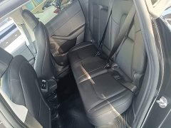Tesla Model Y Rear-Wheel Drive - ფოტო 16