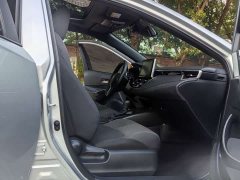 Toyota Corolla Hybrid 1.8H E-CVT Luxury - ფოტო 10