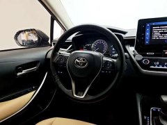 Toyota Corolla Hybrid 1.8L E-CVT Elite - ფოტო 11