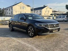 Volkswagen Passat 380TSI Luxury - ფოტო 1
