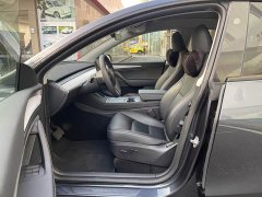 Tesla Model Y Rear-Wheel Drive - ფოტო 4