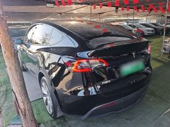 Tesla Model Y Rear-Wheel Drive - ფოტო 4