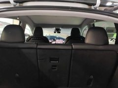 Tesla Model Y Rear-Wheel Drive - ფოტო 17