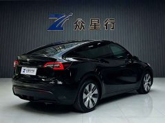 Tesla Model Y Standard Range RWD - ფოტო 4