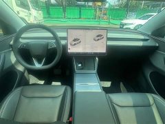 Tesla Model Y Rear-Wheel Drive - ფოტო 3