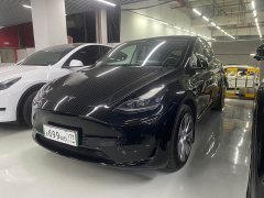 Tesla Model Y Rear-Wheel Drive - ფოტო 1
