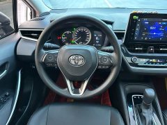 Toyota Corolla 2021 Hybrid 1.8L E-CVT Elite - ფოტო 11