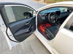 Toyota Corolla 2021 Hybrid 1.8L E-CVT Elite - ფოტო 13