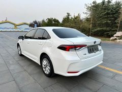 Toyota Corolla 2021 Hybrid 1.8L E-CVT Elite - ფოტო 5