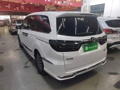 Honda Odyssey 2.0L e:HEV Luxury - ფოტო 4