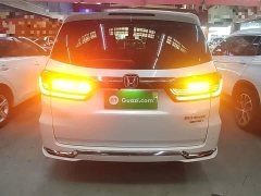 Honda Odyssey 2.0L e:HEV Luxury - ფოტო 5