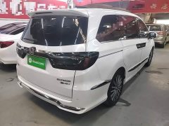 Honda Odyssey 2.0L e:HEV Luxury - ფოტო 6