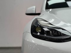 Tesla Model Y Standard Range RWD - ფოტო 11