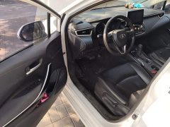 Toyota Corolla 2021 Hybrid 1.8L E-CVT Elite - ფოტო 12