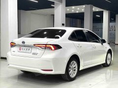 Toyota Corolla 2021 Hybrid 1.8L E-CVT Elite - ფოტო 12
