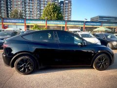Tesla Model Y Rear-Wheel Drive - ფოტო 4