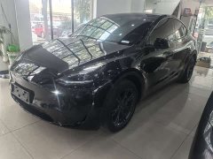 Tesla Model Y Rear-Wheel Drive - ფოტო 1