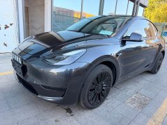 Tesla Model Y Rear-Wheel Drive - ფოტო 1