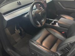 Tesla Model Y Rear-Wheel Drive - ფოტო 3