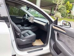 Tesla Model Y Standard Range RWD - ფოტო 9