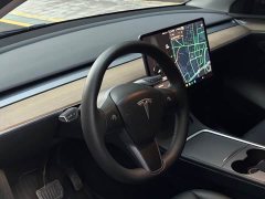 Tesla Model Y Standard Range RWD - ფოტო 9