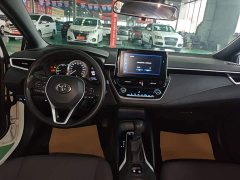 Toyota Corolla Hybrid 1.8H E-CVT Luxury - ფოტო 9