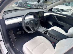 Tesla Model Y Rear-Wheel Drive - ფოტო 4